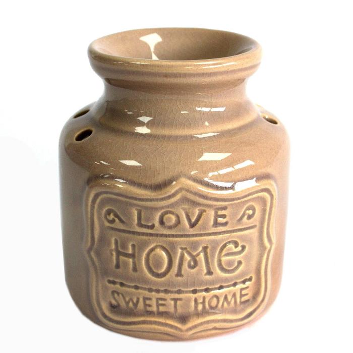 Home oliebrander van 11 x 9 x 9 cm, ideaal voor het verspreiden van geurige olie. Modern en compact ontwerp, geschikt voor elke ruimte in huis.