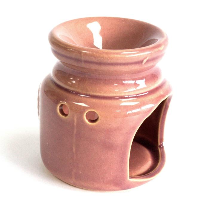 Home oliebrander roze van 7 x 7 x 7 cm, gemaakt van keramiek. Het compacte ontwerp is ideaal voor het verspreiden van geurige olie in kleine ruimtes.